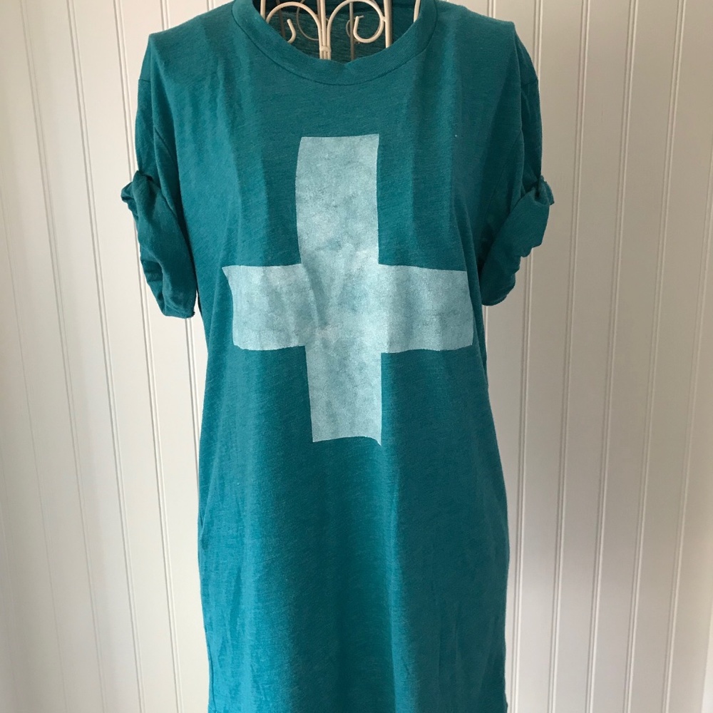 Green cross top with pinned rolled sleeves